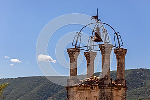 Village bell tower in small restored medieval Lacoste town.Â Vaucluse, France